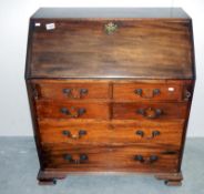 A mahogany bureau with 6 drawers