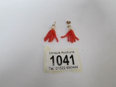 A pair of gold, pearl and coral earrings