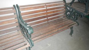 An iron framed garden bench