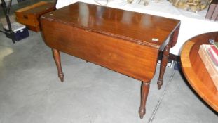 A mahogany Pembroke table