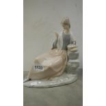 A NAO figure of a lady reading a book