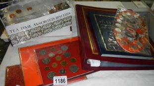 A collection of coins, loose folders,