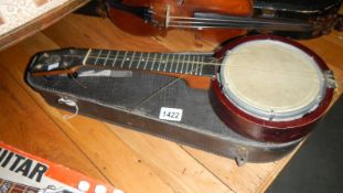A Keech banjolele with case