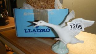 A Lladro figure of Duck Running in original box