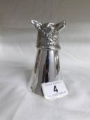 A silver plated fox head stirrup cup