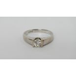 An 18ct white gold quarter carat solitaire diamond ring