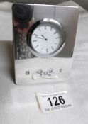 A Concorde silver desk clock