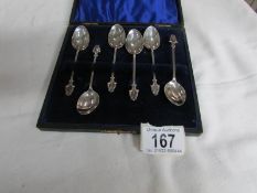 A cased set of silver tea spoons