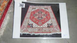 A red ground Heriz rug,