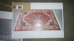 A beige ground Ziegler rug