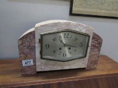 An art deco style clock garniture (needs attention,