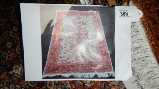 A beige ground Ziegler rug,