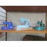 3 children's sewing machines being a blue Vulcan Regal,