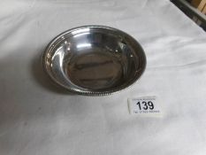 A silver dish,