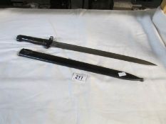 A Belgian bayonet with scabbard (possibly M1949 Export FN T2,