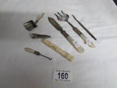 A mixed lot including silver sugar scoop, silver knife,