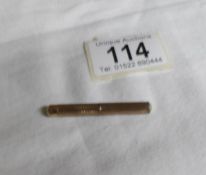 A 9ct gold propelling tooth pick