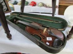 An old cased violin