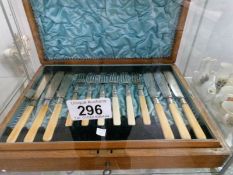 A cased set of 12 Edwardian fish knives and forks