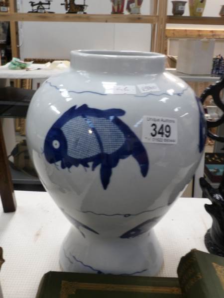 A rare oriental blue and white 'carp' vase