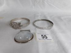 A large silver stone set pendant and 2 silver bangles