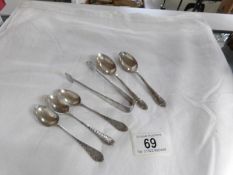 4 silver tea spoons,