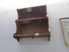 A set of oak wall shelves