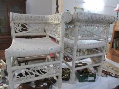 A pair of cane corner chairs (love seat)