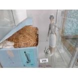 A boxed Lladro figure with geese