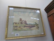 A framed and glazed watercolour church scene