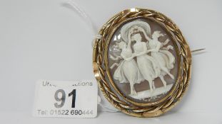 A Victorian cameo depicting the three graces with locket back,
