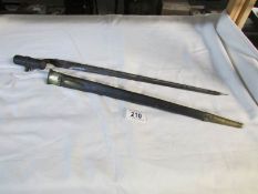 A British pattern 1853 3 band Enfield socket bayonet with scabbard (blade length approximately 17")