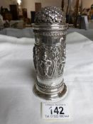 An Anglo Indian silver sifter with Indian dancers,