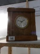 A 1920's 'Save and Die' clock issued by Haagsche Insurance Co.