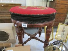 A circular piano stool