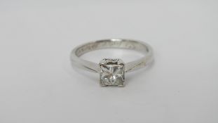 An 18ct white gold three quarter carat diamond solitaire ring