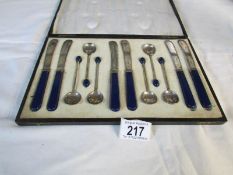 A cased set of EPNS fruit knives and spoons