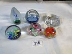 6 glass paperweights