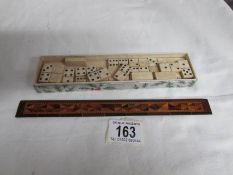 A Tunbridge ware ruler and a set of miniature dominoes