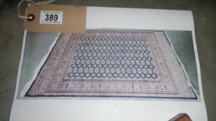 A blue ground Bokhara rug,