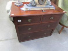 A 2 over 2 mahogany chest of drawers