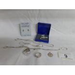 An assortment of silver including chains, ring, pendant etc,