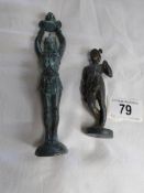 An antique Egyptian metal figure and one other