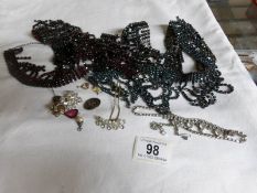 2 large diamonte sparkly fringed necklaces and one other