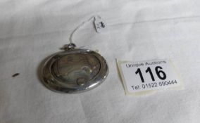 An oval silver snuff fob,