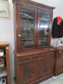 A mahogany 2 door glazed top bookcase