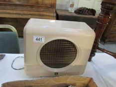 A retro pink bakelite speaker