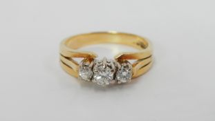 An 18ct gold 3 stone diamond ring of 40 pts