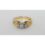 An 18ct gold 3 stone diamond ring of 40 pts