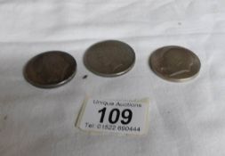 A USA 1926 silver peace dollar and 2 Norwegian 50 Krona commemorative coins,